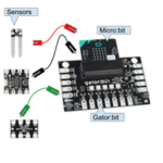 Image is a diagram that shows the micro:bit, (smaller looking electronics component with a 6 by 6 array of small LEDs in the middle) inserted into the Gator:bit (larger electronics board with five LED lights in the middle) with three sensors to the left and three wires between the gator:bit and sensors.